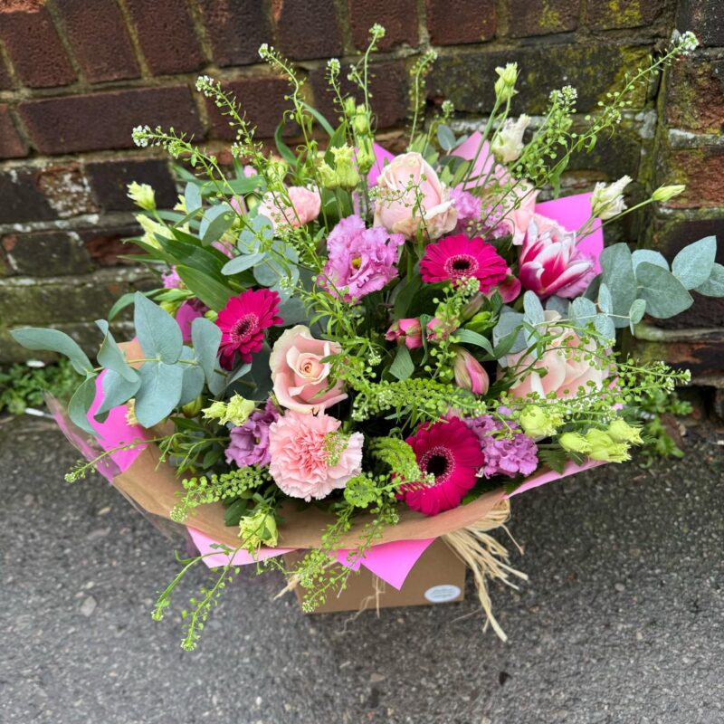 Our Pretty in Pinks Bouquet is a lovely collection of seasonal flowers. Hand tied and wrapped in natural paper. Order online for next day delivery.