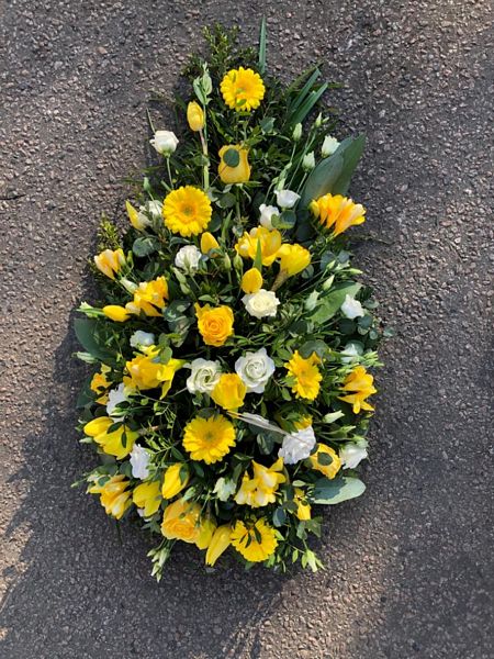 Tear Drop Arrangement Funeral Tribute. Our Funeral, Sympathy and Tribute flowers are delivered with care and with free delivery.
