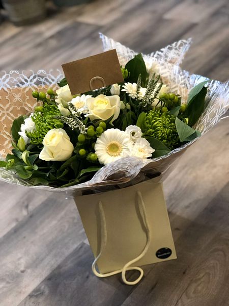 Enjoy for yourself or send as a present, this stunning Purity Hand Tied Bouquet in a gift bag of white. Order online for next day delivery.