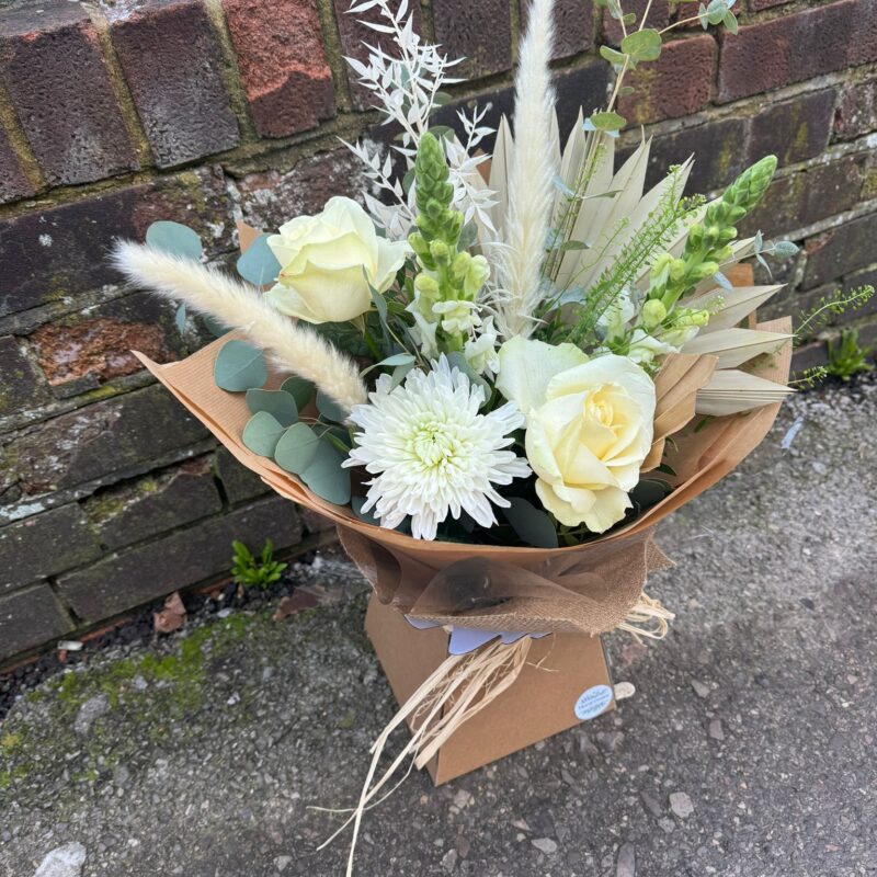 Fresh and Dried Flower Bouquet. Wrapped in brown paper and gift box. Order online for your next day flower delivery. Bishops Stortford