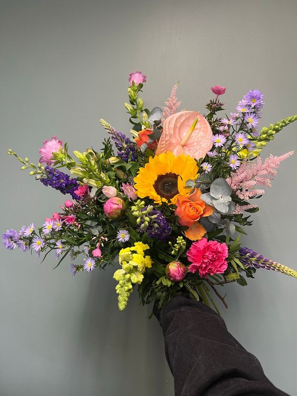 A selection of florists choice. Vibrant and Bold Bouquet. The perfect gift. Order online for your next day flower delivery. Bishops Stortford