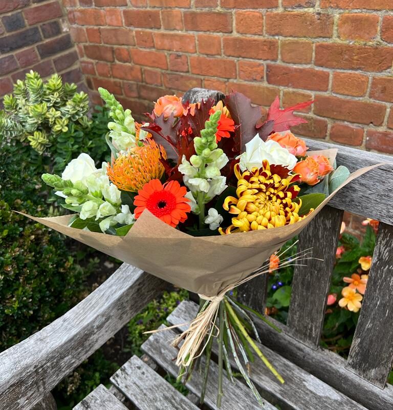 This Fall Bouquet in ivories, burnt oranges and burgundies. Order online for your next day flower delivery. Bishops Stortford