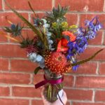 Florists Choice Jam Jar Vase Arrangement modern design using luxurious colours is the perfect gift. Order online for your next day flower delivery. Bishops Stortford