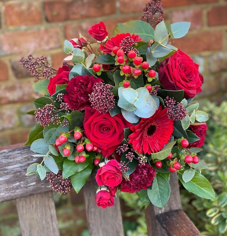 Jingle Bells Bouquet. Beautifully wrapped and placed in a gift box. Order online for your next day flower delivery. Bishops Stortford