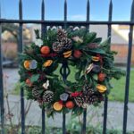 Merry Christmas Wreath. This Christmas favourite is jam packed full of festive fun. Order online for your next day flower delivery. Bishops Stortford