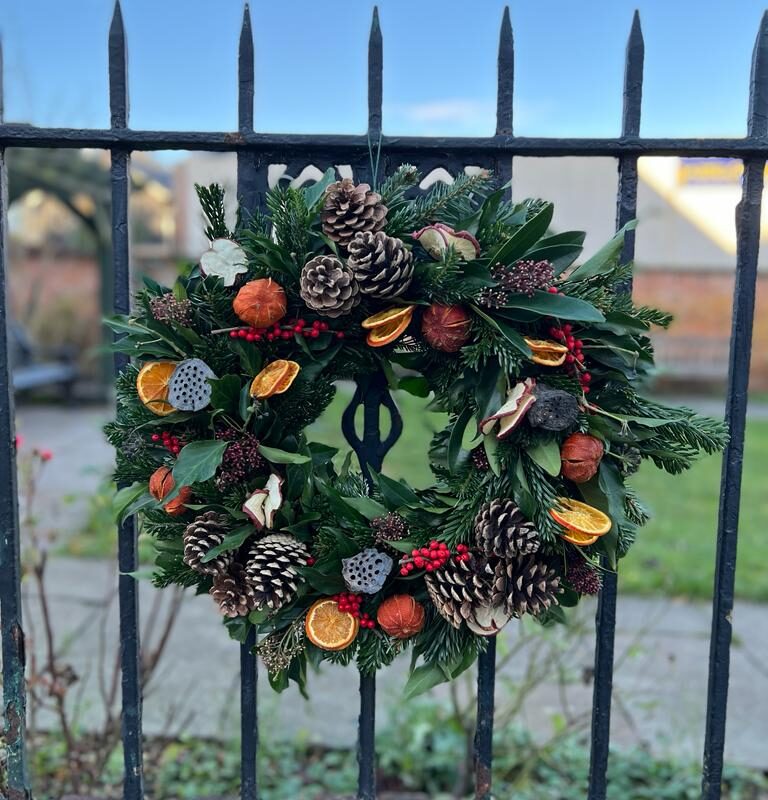 Merry Christmas Wreath. This Christmas favourite is jam packed full of festive fun. Order online for your next day flower delivery. Bishops Stortford