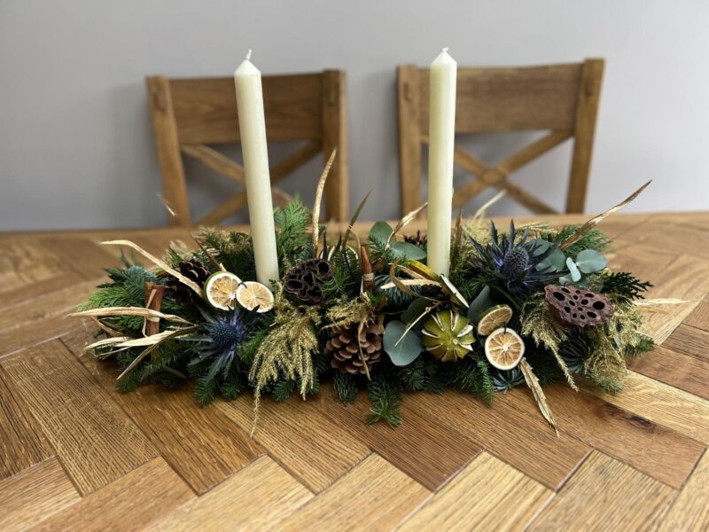 Noel - a showstopper of a Christmas table arrangement - Order online for your next day flower delivery. Bishops Stortford