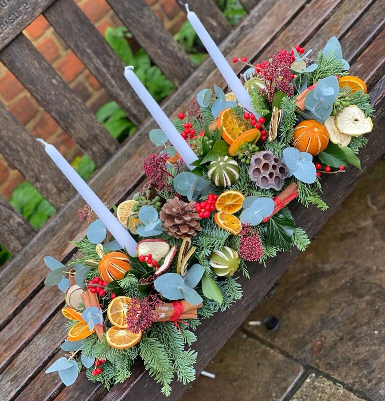 Noel - a showstopper of a Christmas table arrangement - Order online for your next day flower delivery. Bishops Stortford