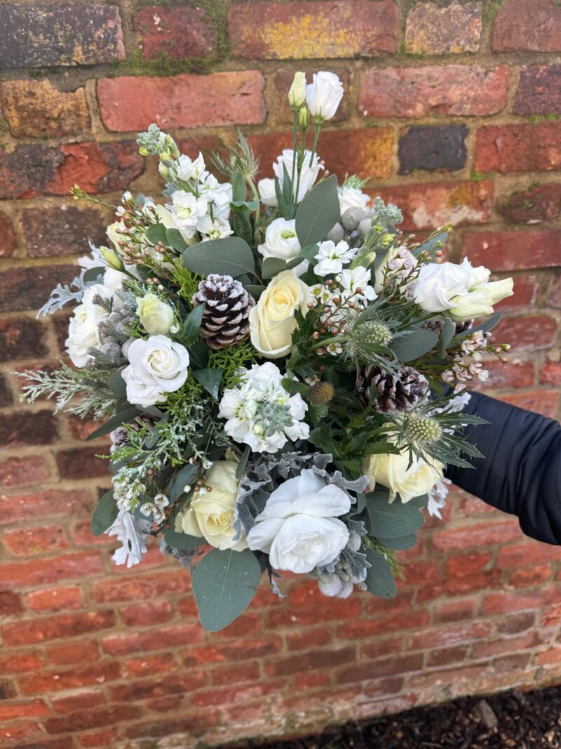 This Snow Bouquet is filled with white roses and delicate white flowers. Order online for your next day flower delivery. Bishops Stortford