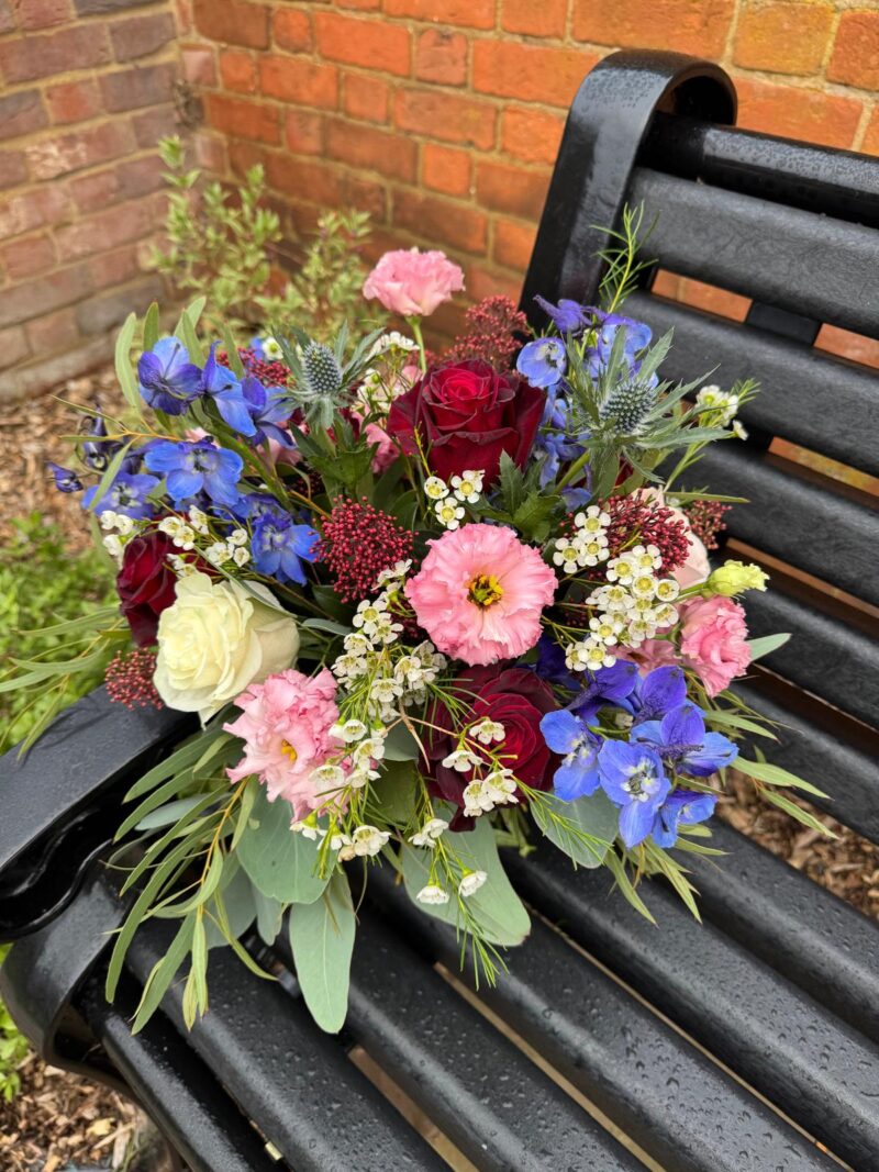 Get in the Christmas spirit with this festive floral handtie. Spirit Bouquet. Order online for your next day flower delivery. Bishops Stortford