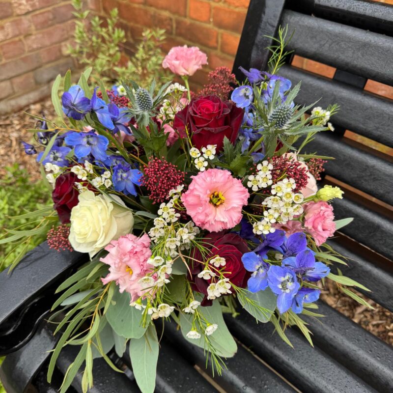 Get in the Christmas spirit with this festive floral handtie. Spirit Bouquet. Order online for your next day flower delivery. Bishops Stortford