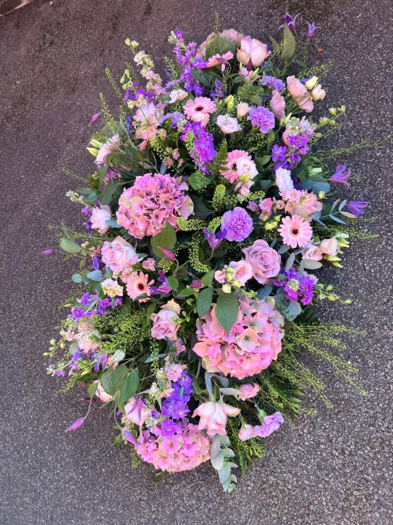 A Coffin Spray is a beautiful floral arrangement that adorns the top of the coffin. Order online with your personal choices. Bishops Stortford