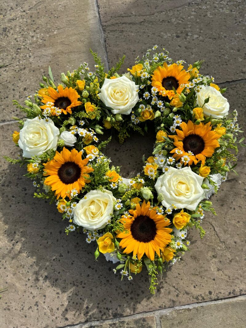 A simple and understated Open Heart Funeral Tribute sent with love. Order online with your personal choices. Bishops Stortford