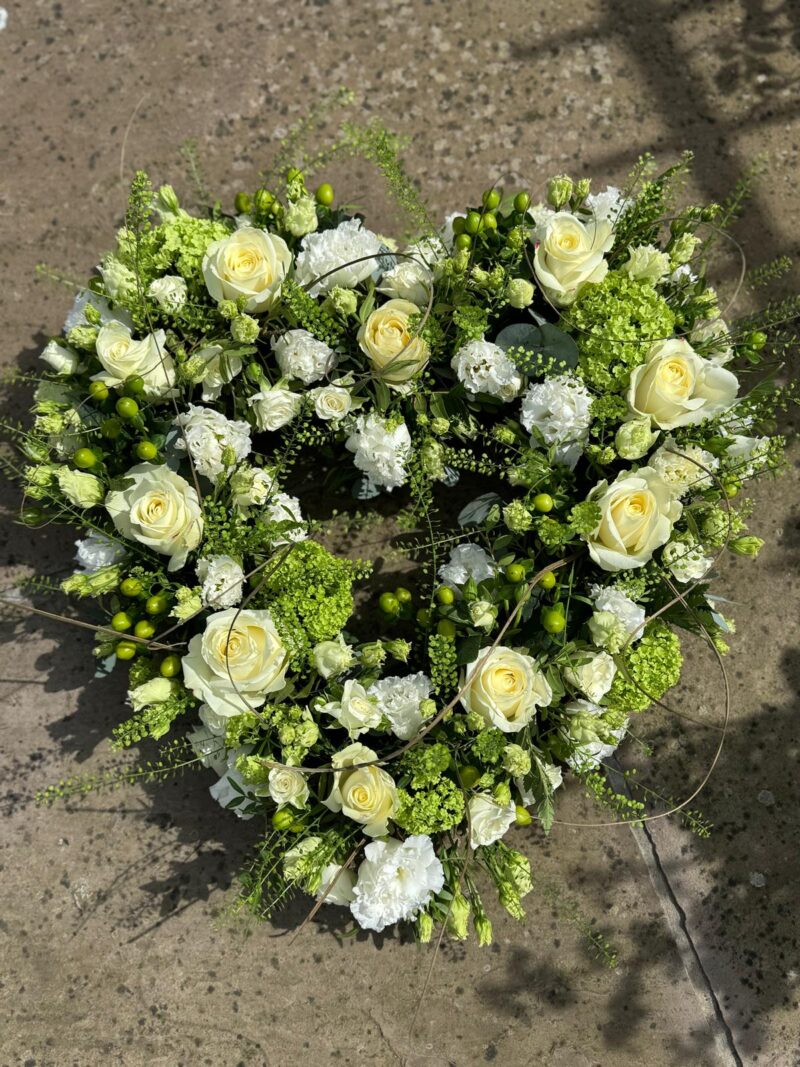 A simple and understated Open Heart Funeral Tribute sent with love. Order online with your personal choices. Bishops Stortford