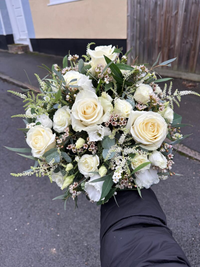 A traditional posy shape with loose flowers and seasonal foliage. Funeral Tribute. Order online with your personal choices. Bishops Stortford