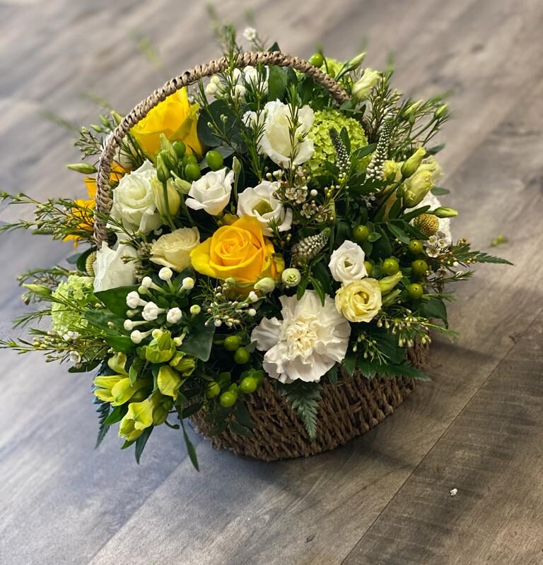 A wickers basket made in a selection of colours for your loved one. A Funeral Tribute. Order online with your personal choices. Bishops Stortford