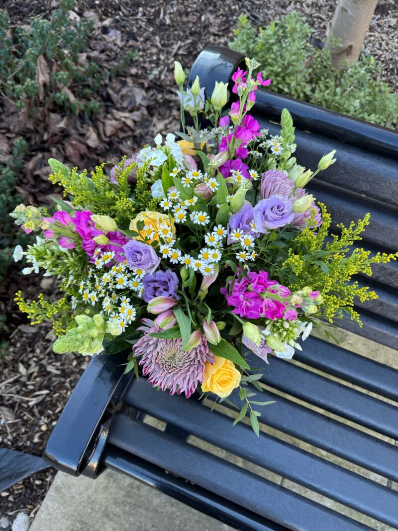 Buttercup Bouquet - a variety of flowers in pastel shades and lush foliage. Order online for your next day flower delivery. Bishops Stortford