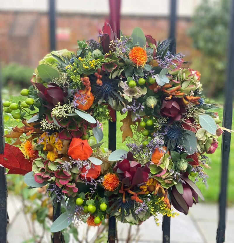 Follow the trend with this beautiful Autumnal Wreath hanging on your door. Order online or visit our shop in Bishops Stortford