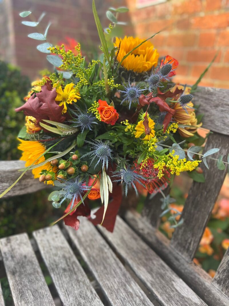 This hand tie Bonfire Bouquet has autumnal warmth. Order online or visit our shop in Bishops Stortford