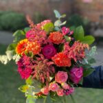 This Sunset Bouquet has rich colours to brighten everyone's day. Order online or visit our shop in Bishops Stortford