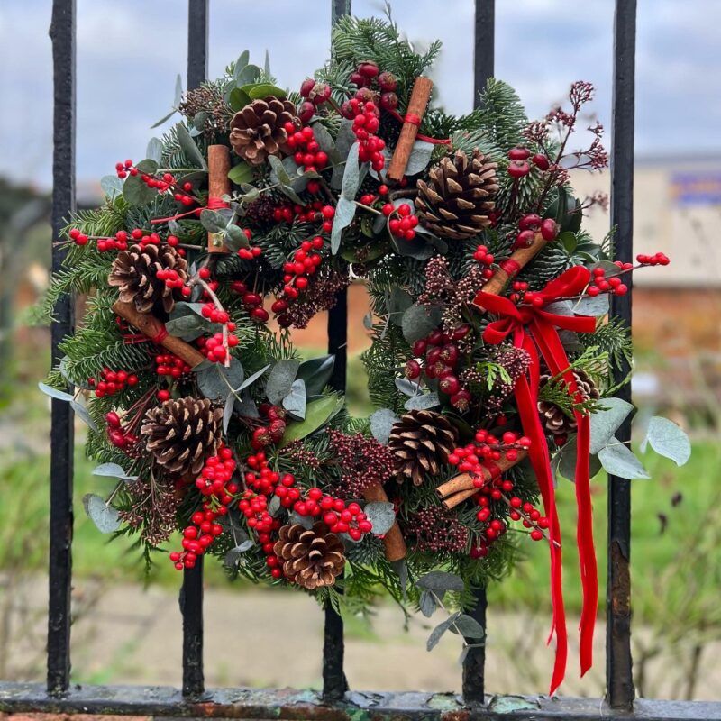 Berry Christmas Door Wreath, a natural beauty. Perfect rustic, natural feel this Christmas. Order online for your next day flower delivery. Bishops Stortford
