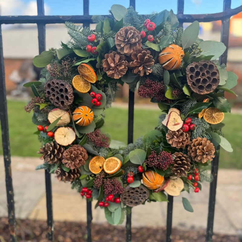 Fruits of the Forest Wreath jam packed full of festive fun for your Christmas door. Order online for your next day flower delivery. Bishops Stortford
