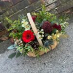Joy Table Arrangement. A basket arrangement perfect for Christmas. Order online for your next day flower delivery. Bishops Stortford