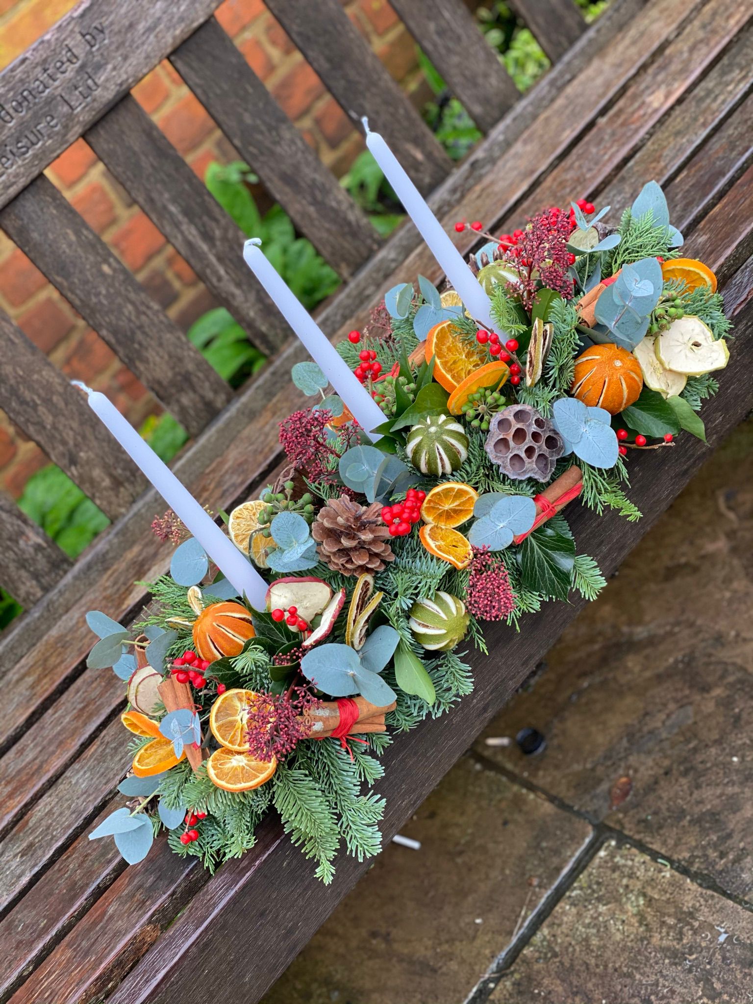 Noel Christmas Table Arrangement. A showstopper for your Christmas table. Order online for your next day flower delivery. Bishops Stortford