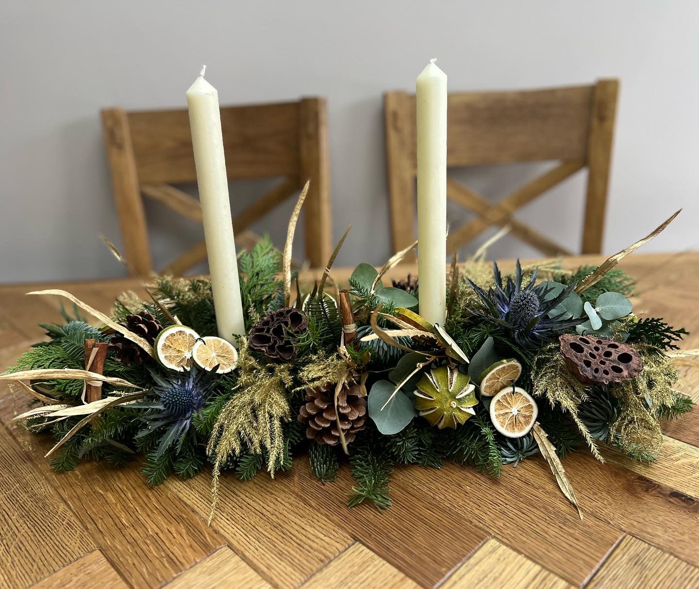 Noel Christmas Table Arrangement. A showstopper for your Christmas table. Order online for your next day flower delivery. Bishops Stortford