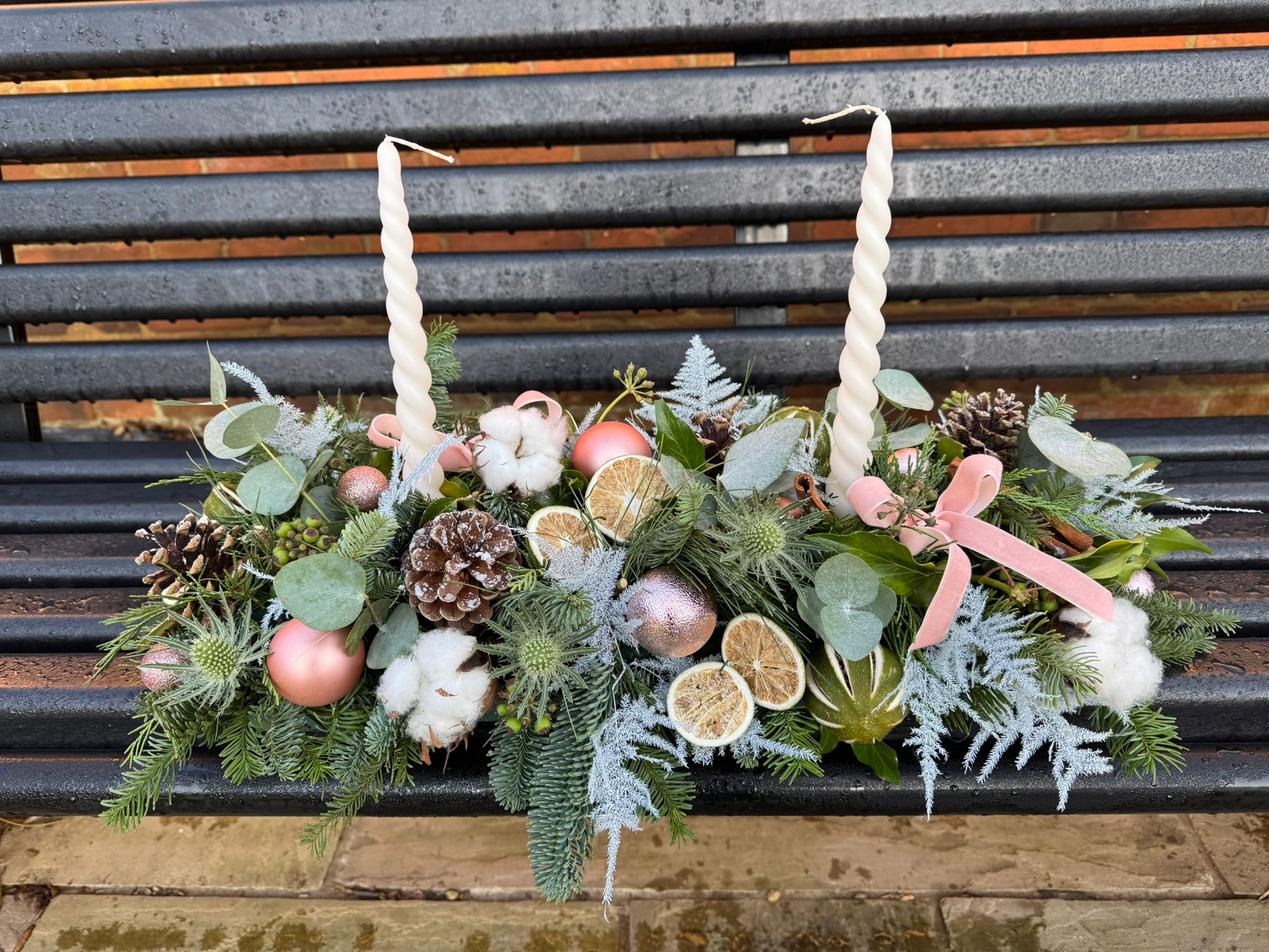 Noel Christmas Table Arrangement. A showstopper for your Christmas table. Order online for your next day flower delivery. Bishops Stortford