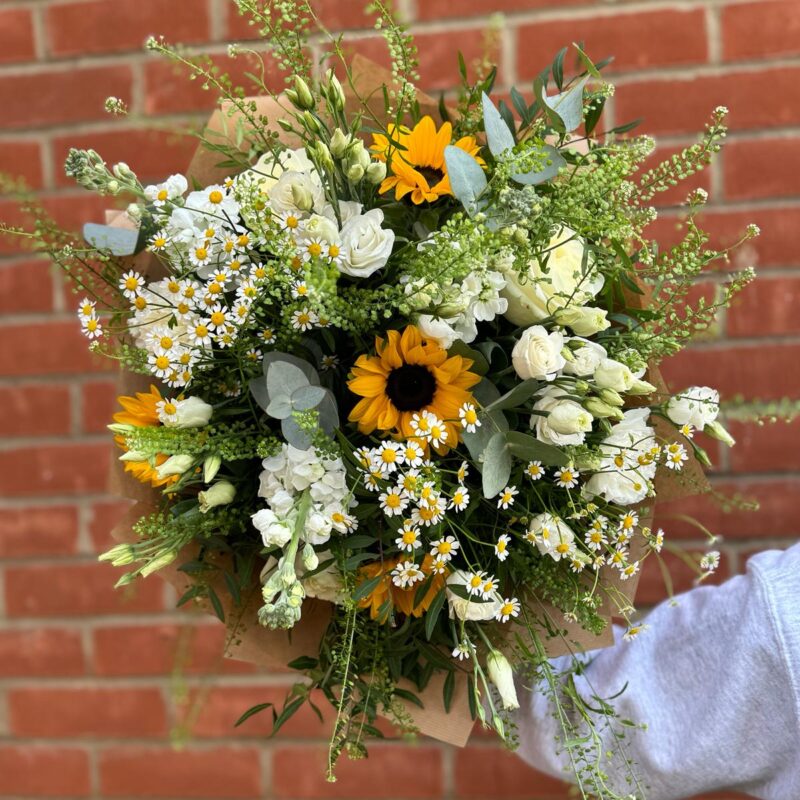 Mellow Yellow Bouquet symbolising friendship. Cheerful tones make this bouquet the perfect gift. Order online for next day delivery.