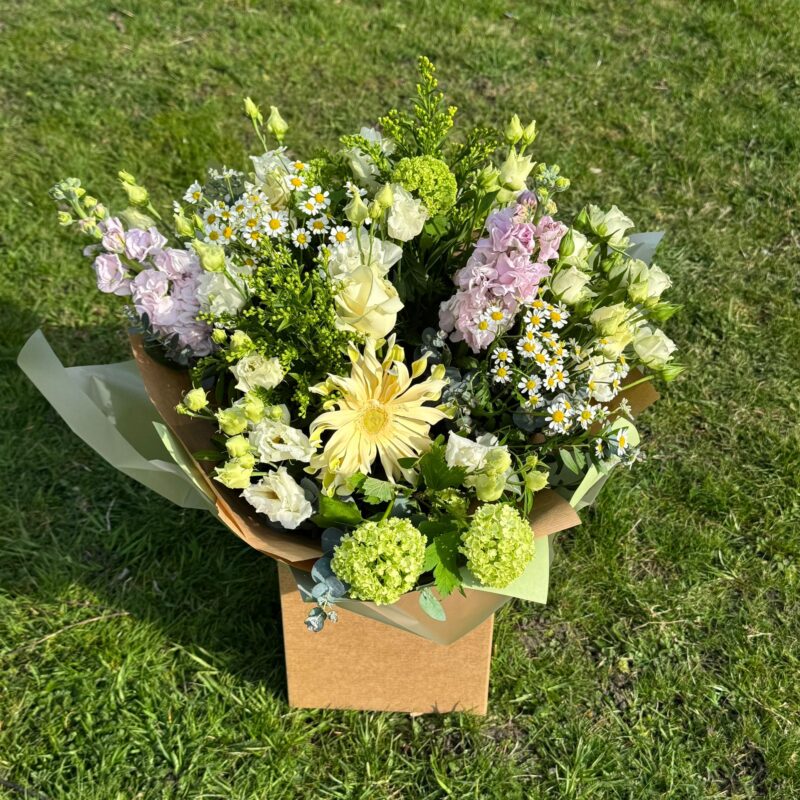 Cottage Blush, blush, lemons and green flowers make up this bouquet. Order online for your next day flower delivery. Bishops Stortford
