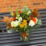 Fall Bouquet. A beautiful selection of autumnal blooms in ivories and burgundies. Order online for next day delivery or shop in store.